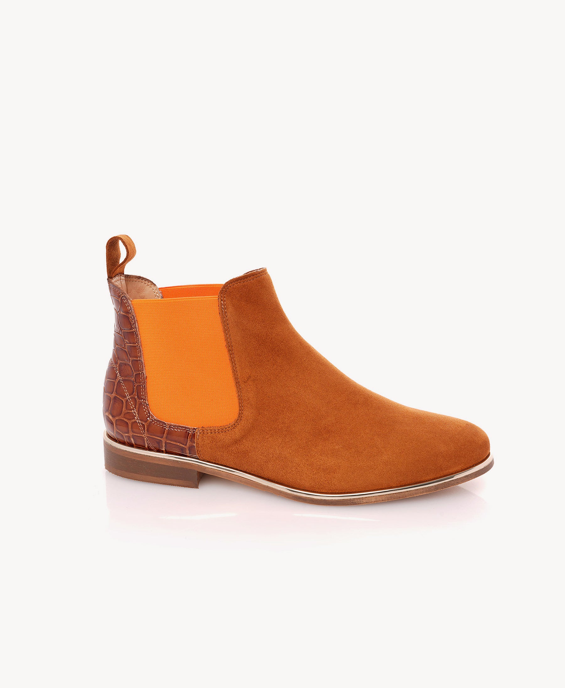 A single women's ankle boot in warm camel brown suede with a bright orange elastic side panel and a darker brown crocodile-embossed heel panel, shown on a clean white background.