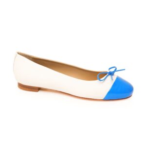 White leather ballet pump with bright blue patent toe and bow, handmade in Italy by Nicola Sexton