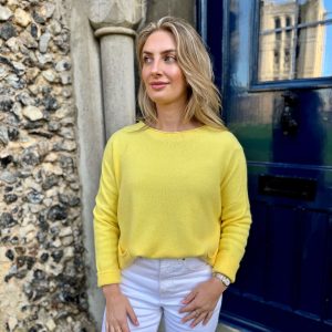 Nicola Sexton yellow pocket knit jumper with relaxed silhouette and pockets